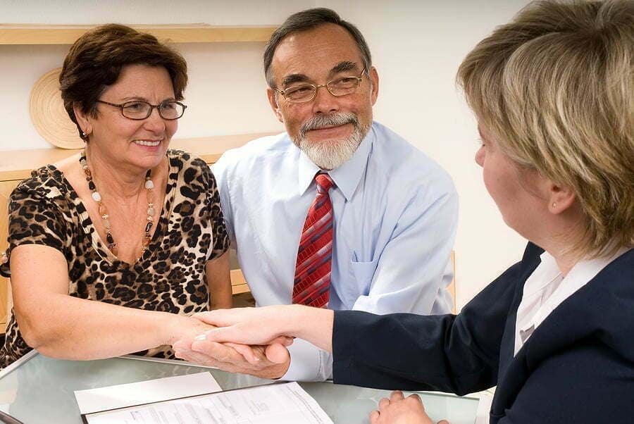MakingARentalPropertyManagment Agreement McCormack Realty Renters Choice Homes Property Management Magic owners signing an agreement with McCormack Realty Renters Choice Homes